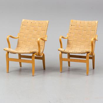 A pair of 'Eva' easy chairs by Bruno Mathsson, Firma Karl Mathsson, Värnamo 1973.