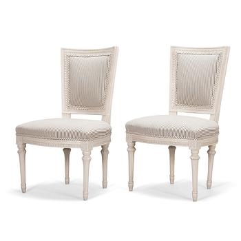 A pair of Swedish Gustavian chairs, made in Stockholm in the late 18th century.