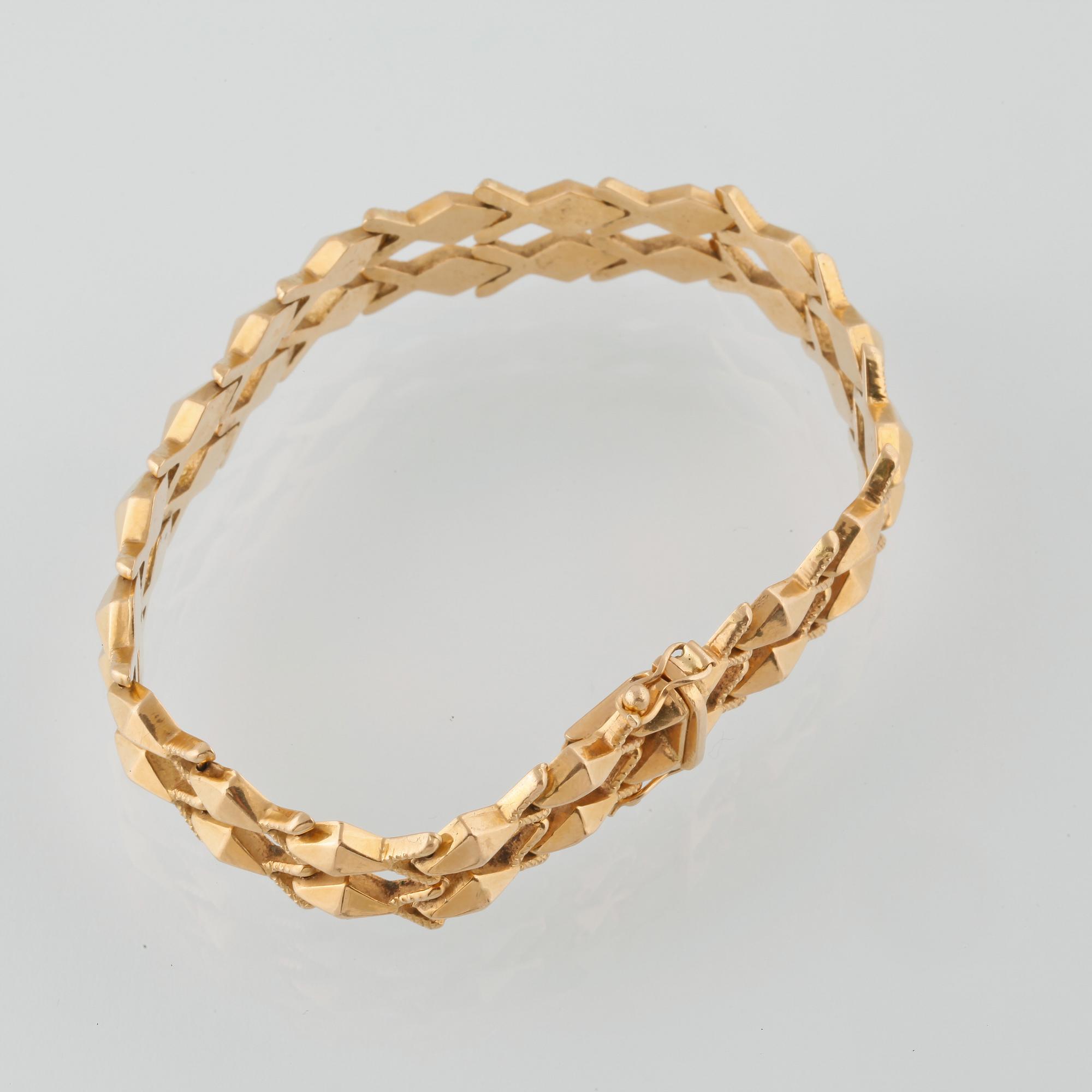 ARMBAND, 18K guld, kattfotstämplat. Vikt 20,7 gram.