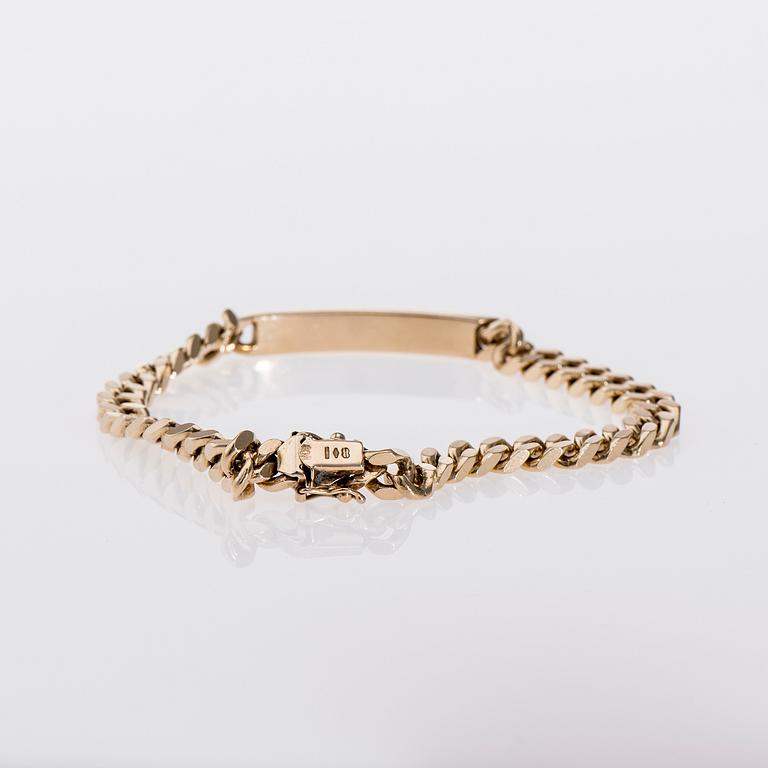 ARMBAND, 14K kultaa, pansarked. Vikt 38 g.