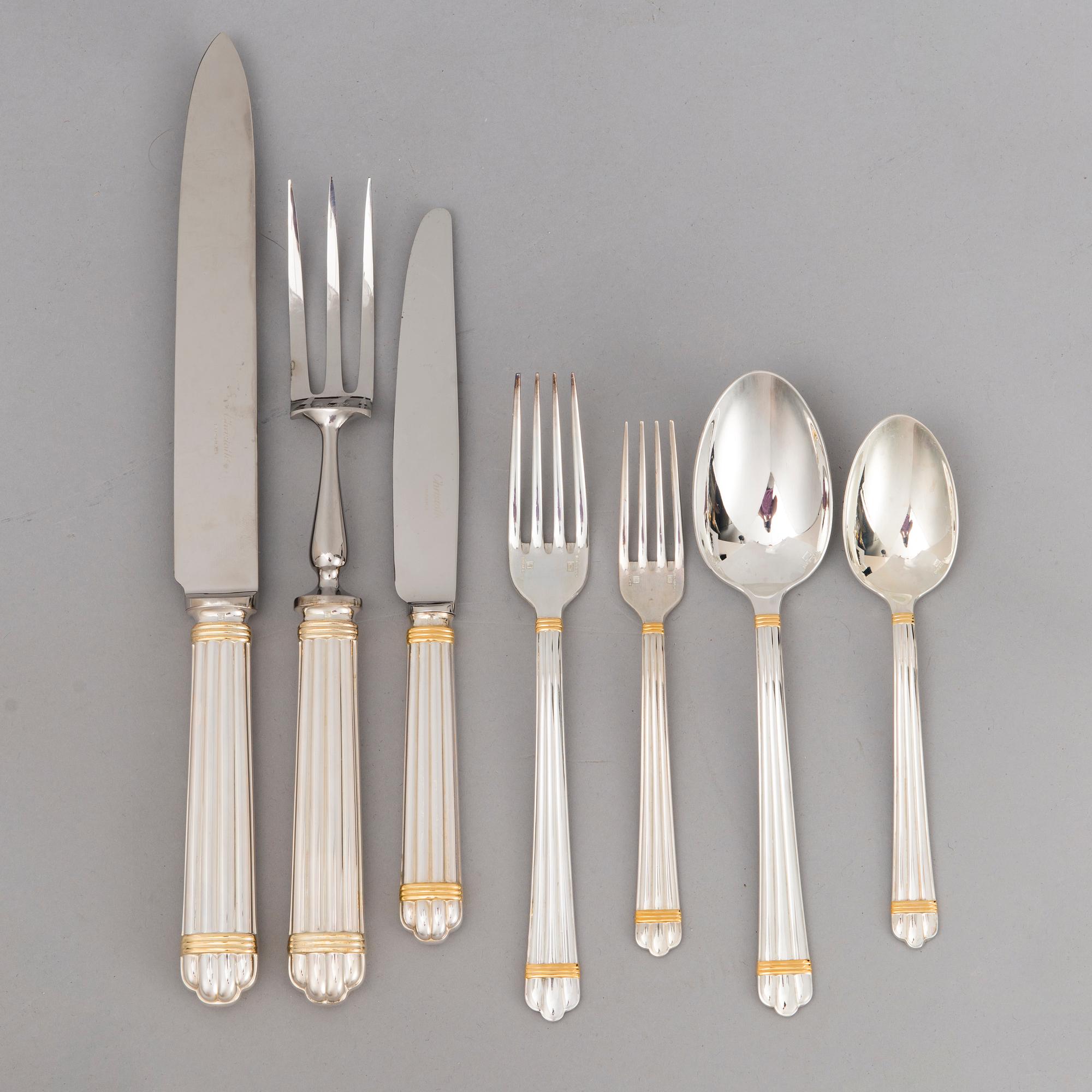 CHRISTOFLE 123-piece Aria Gold Ring Silver Plated Cutlery Set for Twelve persons.