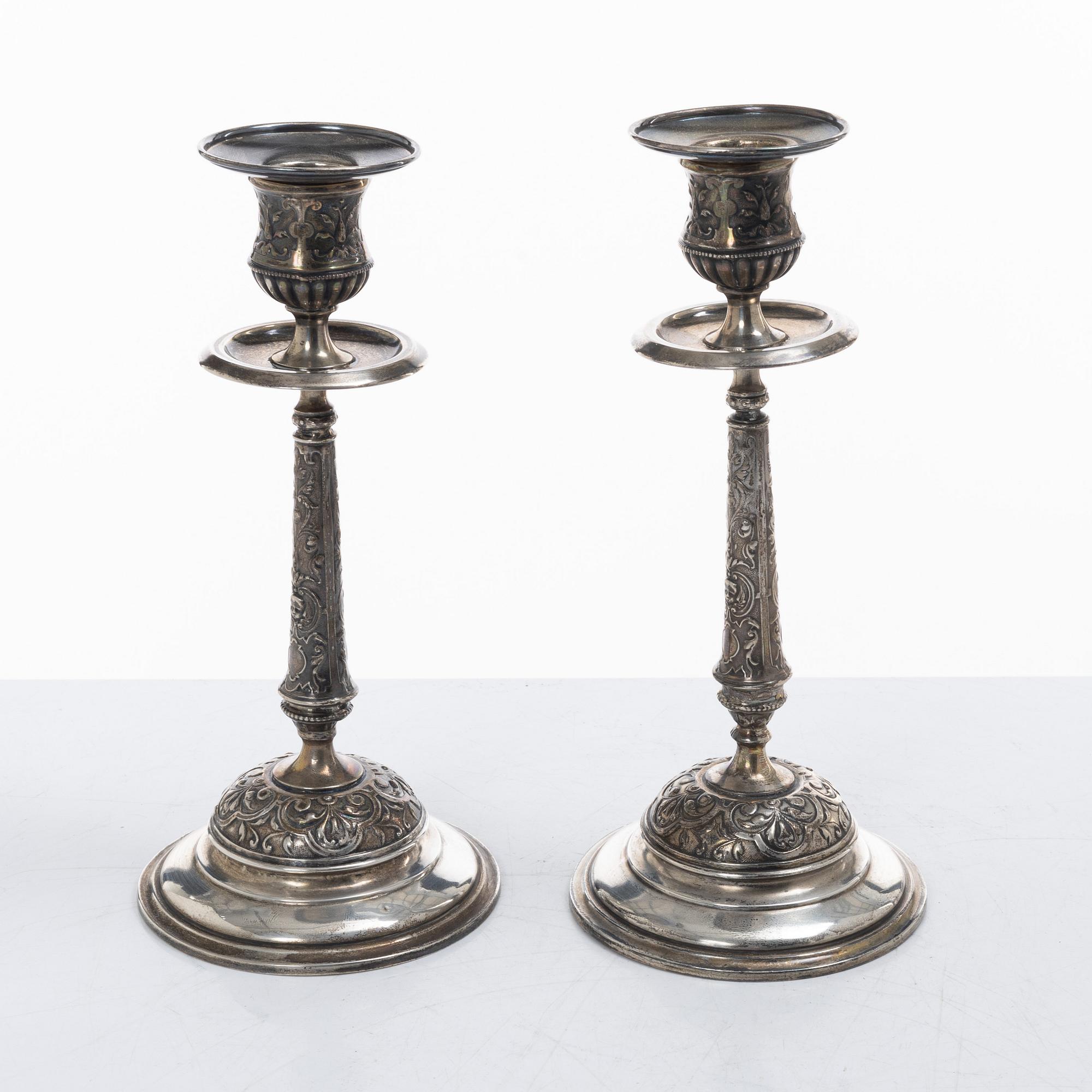 A pair of Swedish silver Renaissance-revival candlesticks, mark of CG Hallberg, Stockholm 1883.