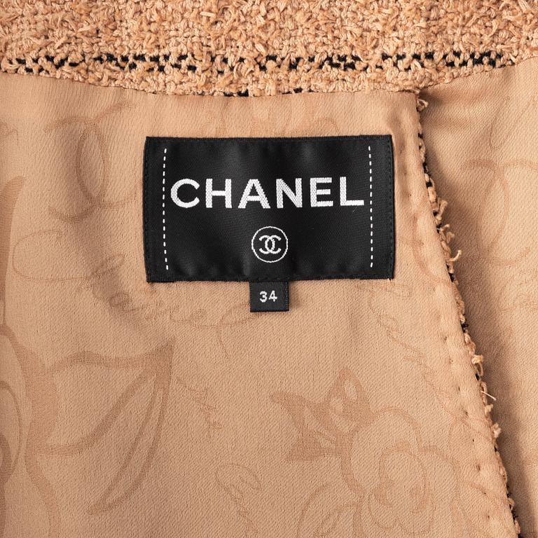 Chanel, a beige cotton tweed jacket, french size 34.