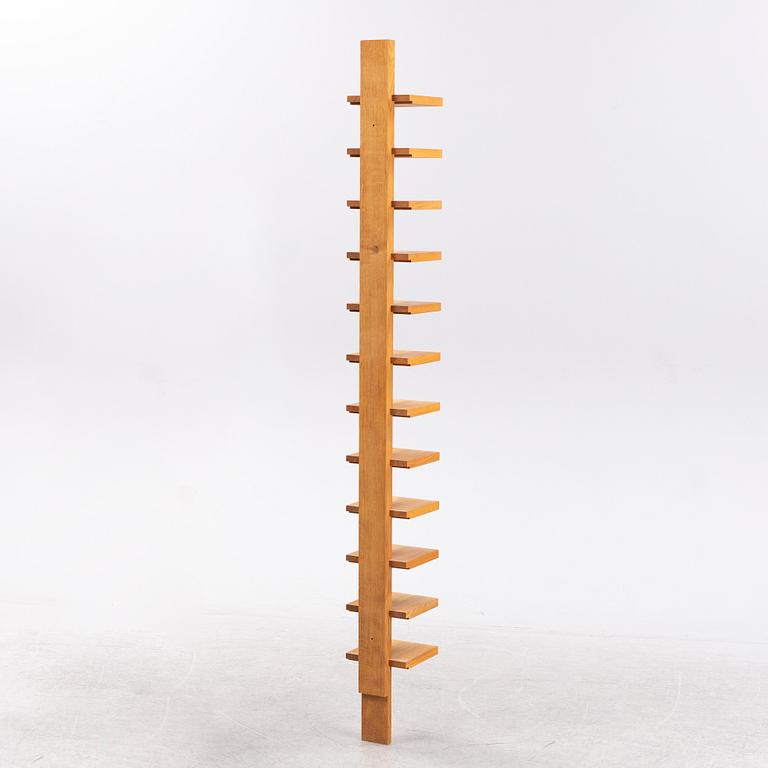 A 'Pilaster' shelf by John Kandell for Källemo, designed 1989.