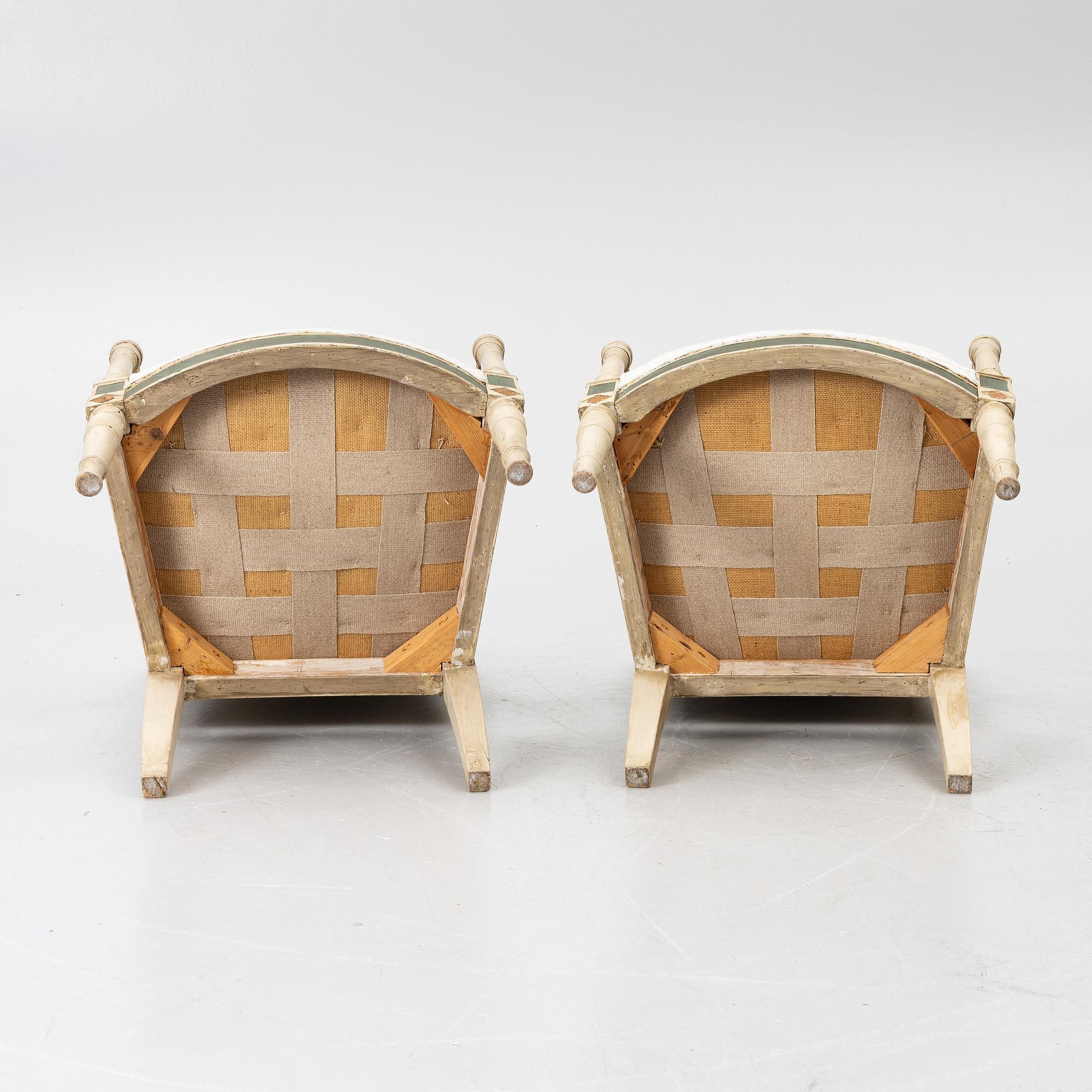 A pair of armchairs, Directoire, France, late 18th Century.