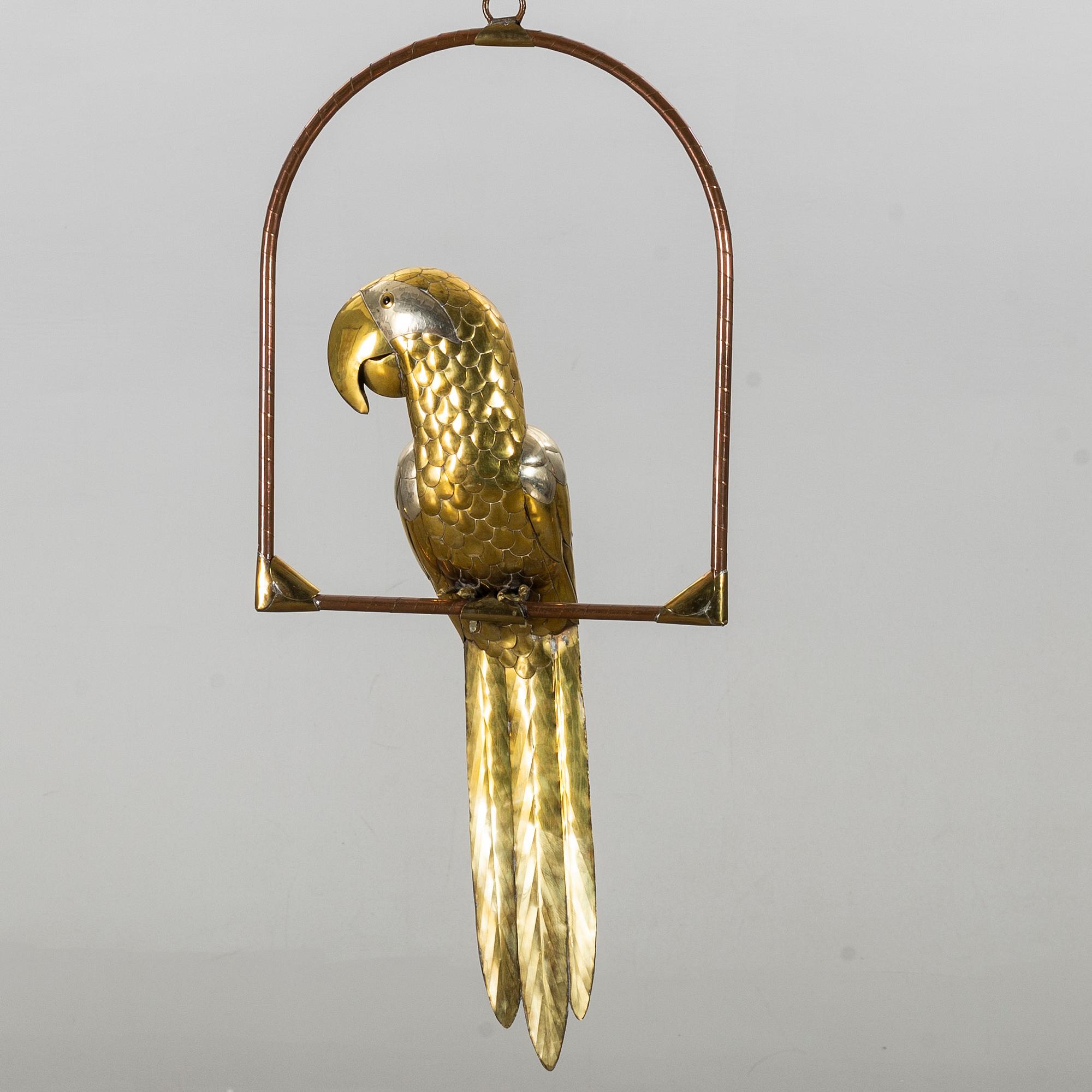 SERGIO BUSTAMENTE, sculpture in the form of a parrot.