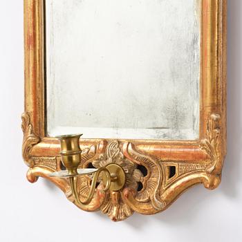 A pair of giltwood one-branch girandole mirrors by JP Larsson.