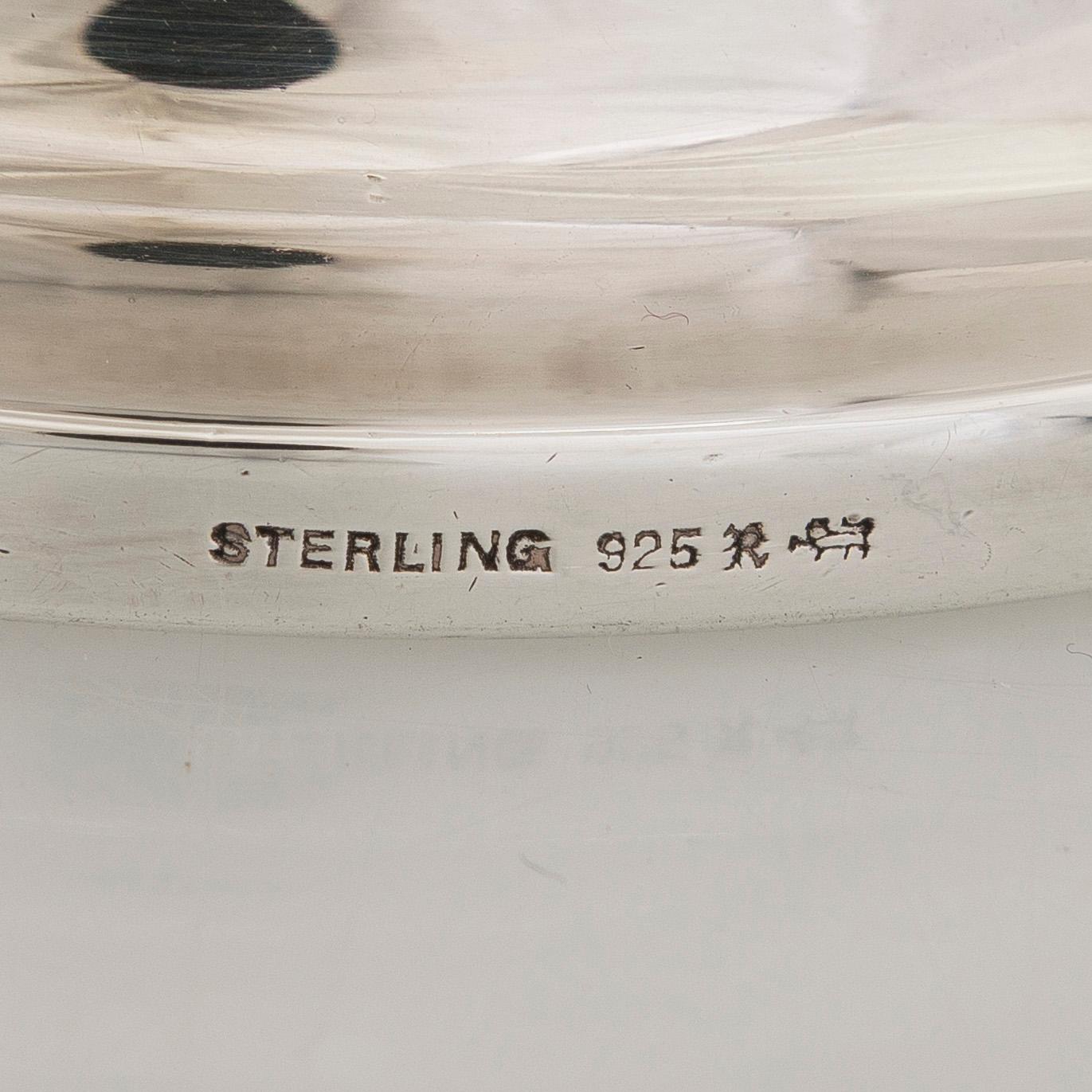 A sterling silver jug, Ellis Bros England.