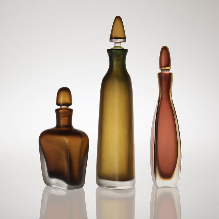 Three Paolo Venini 'Inciso' bottles, Venini, Murano, Italy, 1950's.