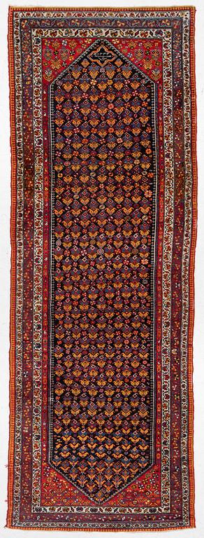 A semi-antique Hamadan, Western Persia, c. 421 x 145 cm.