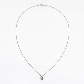 A platinum necklace, with a round brilliant-cut diamond ca. 0.10 ct.