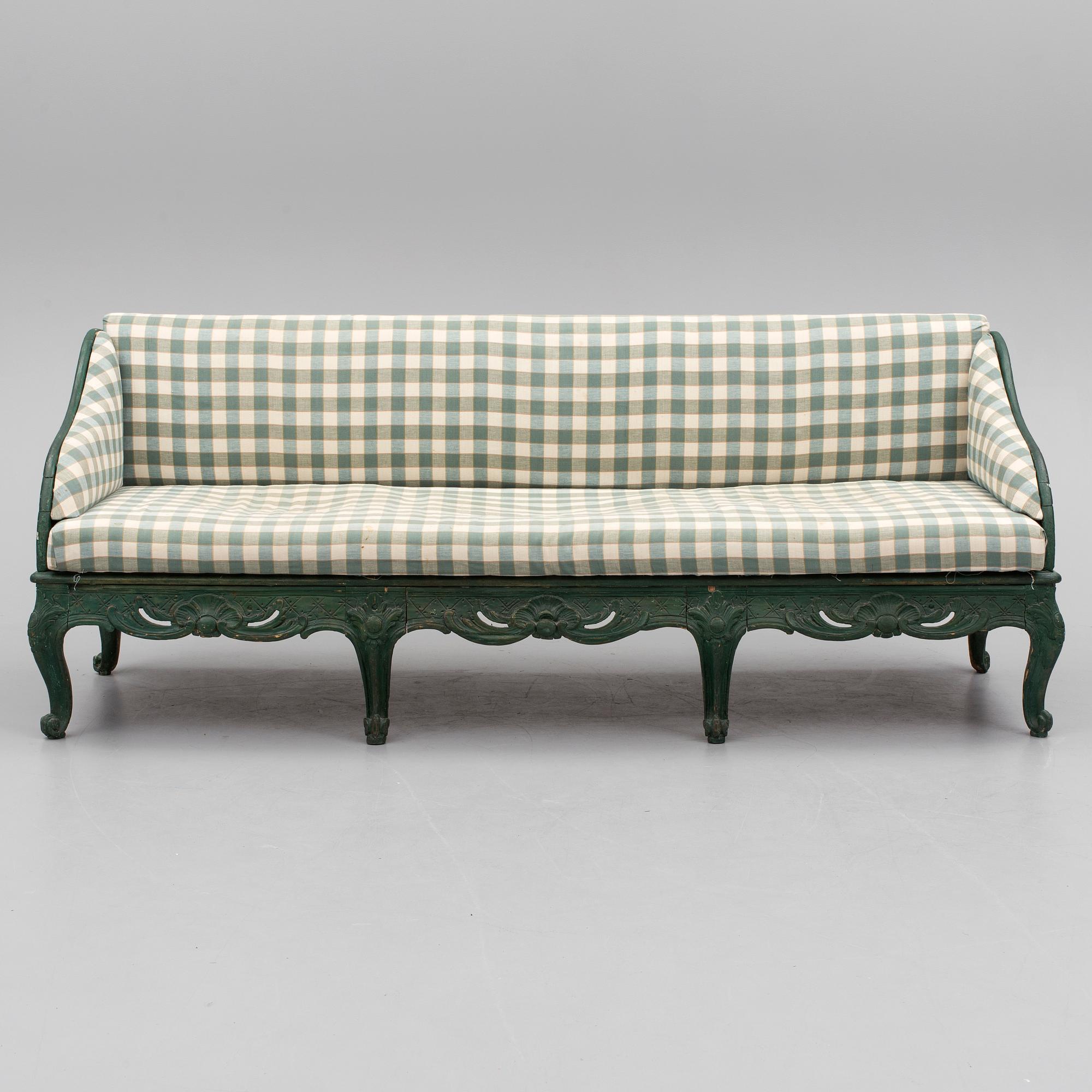A mid 18th century rococo sofa.