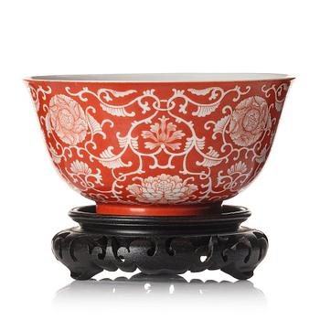 1012. A coral red reverse decorated lotus bowl, Qing dynasty with Daoguang mark in underglaze blue.