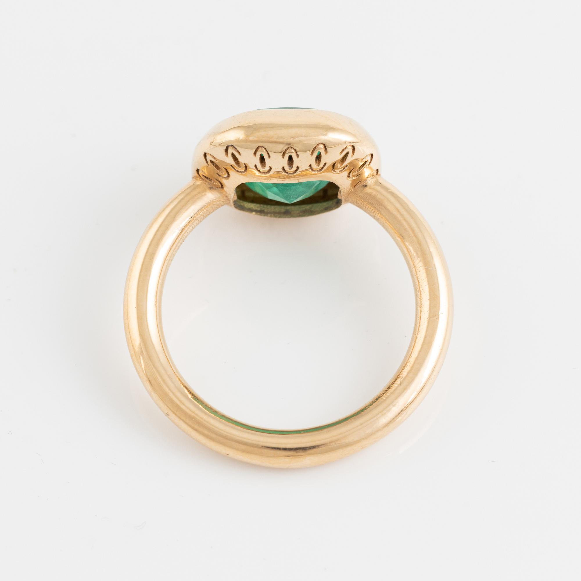 18K gold and cushion shaped emerald ring.
