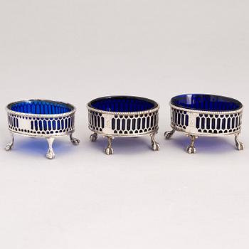 Three 18th Century sterling silver salt cellars, mark of Edward Lowe and Francis Stamp, London 1769 and 1780s.