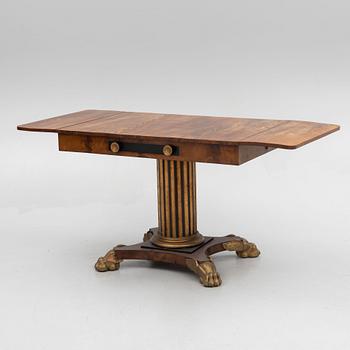 An Empire table, first half of the 19th Century.