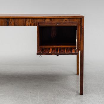 ERIK WÖRTZ, a rosewood veneered desk, IKEA, 1960's.