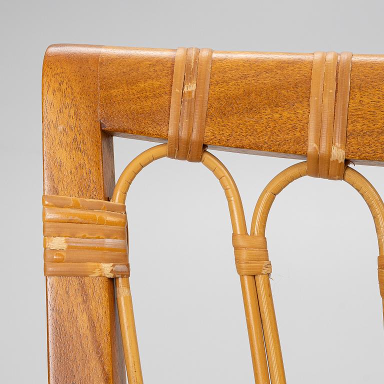 Josef Frank, a set of 8+2 dining chairs, model 1165, Svenskt Tenn, ca 1987.