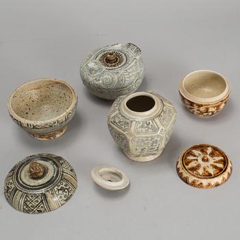 A group of four Swankhalok jars with covers, 16th/17th Century.