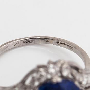 A. Tillander, a platinum ring, set with a cushion-cut sapphire and brilliant- and octagonal-cut diamonds.