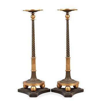 1211. A pair of late Gustavian early 19th century candle stands.