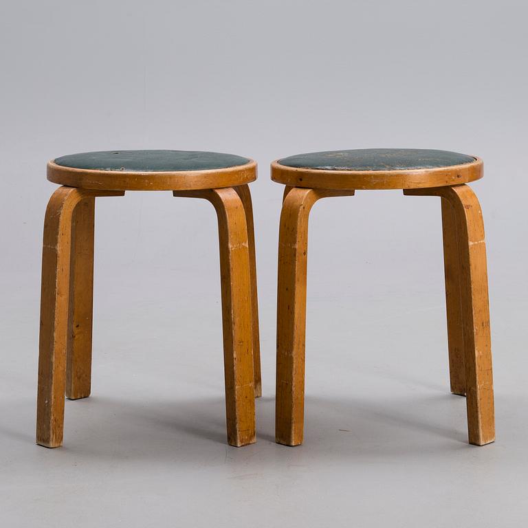 ALVAR AALTO, A PAIR OF STOOLS.