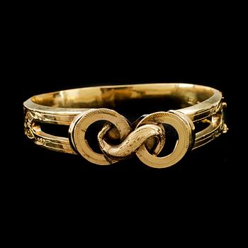 ARMRING, 18k guld. Helsingfors, 1861. Vikt ca 19g.