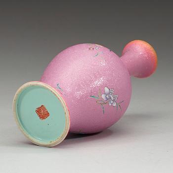 A pink and famille rose vase, Qing dynasty 19th century. With Qianlongs seal mark.