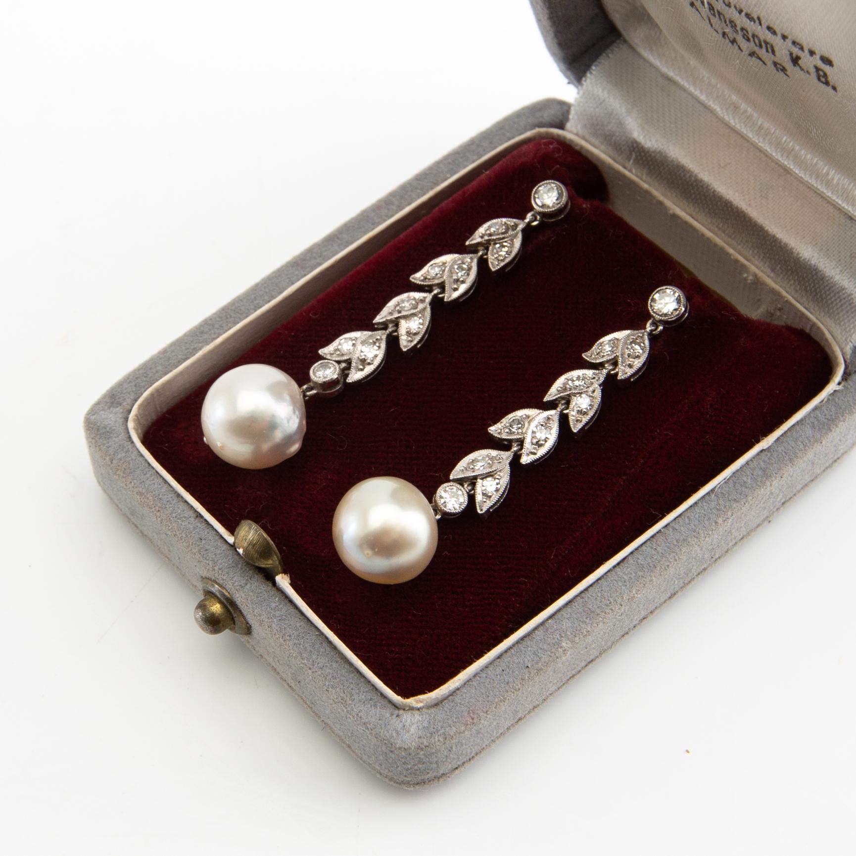 Earrings, a pair, 18k white gold with pearls and diamonds.