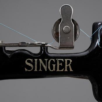 RESESYMASKIN, Singer, 1900-talets första hälft.