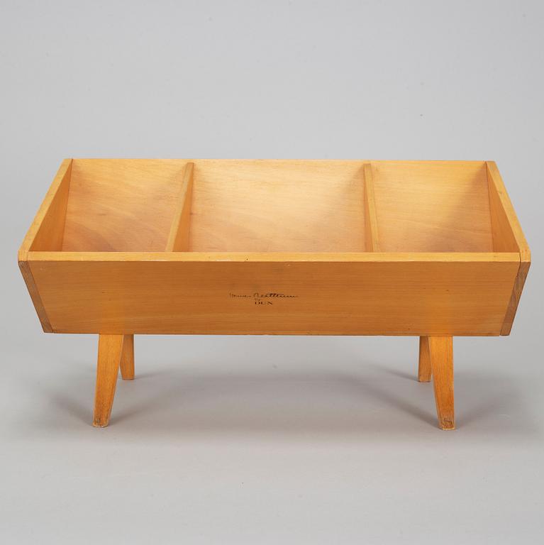 A 1990s book shelf designed by Bruno Mathsson.