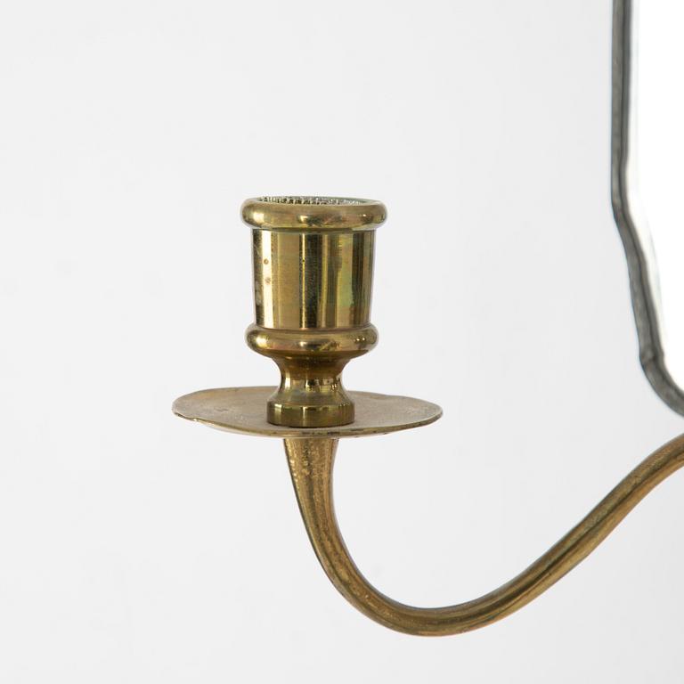 A pair of Swedish rococo engraved glass two-branch girandole mirrors, later part 18th century and later.