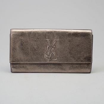 a YVES SAINT LAURENT clutch.