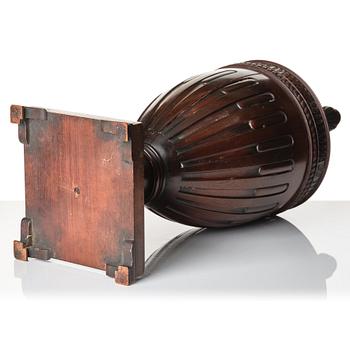 A mahogany carved Urn Cutlery box in George III style, around year 1800.