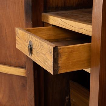 A Chinese hardwood cabinet, 20th century.
