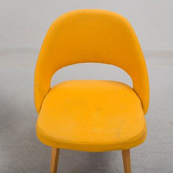 A group eight of Eero Saarinen executive side chair with wood legs, Knoll Products inc.
