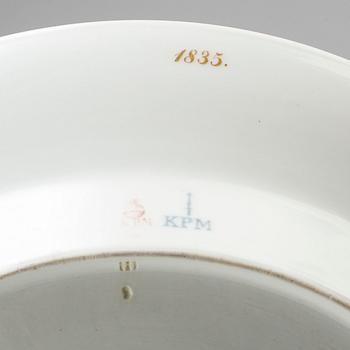 A first half of the 19th century porcelain plate and sauce boat, KPM, Berlin, Germany.