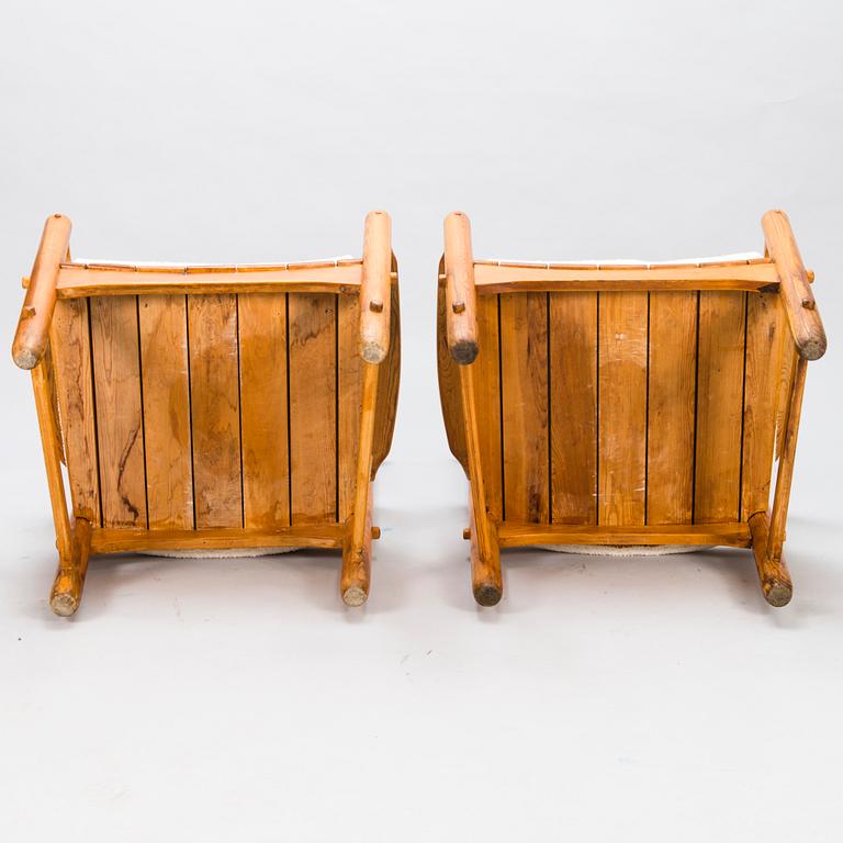 LASSE OLLINKARI, a pair of 1948 open armchairs.