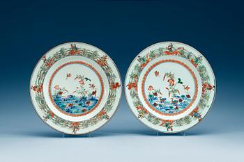 1702. A pair of famille-verte chargers, Qing dynasty, Qianlong (1736-95).