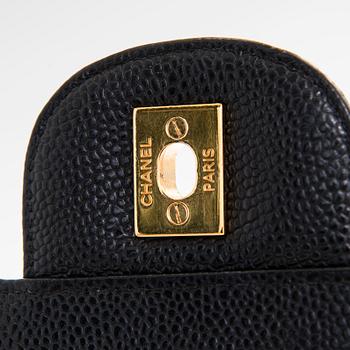 Chanel, a 'Double Flap Bag Maxi' bag, 2010-2011.