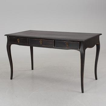 A partially rococo, 18th century writing desk.