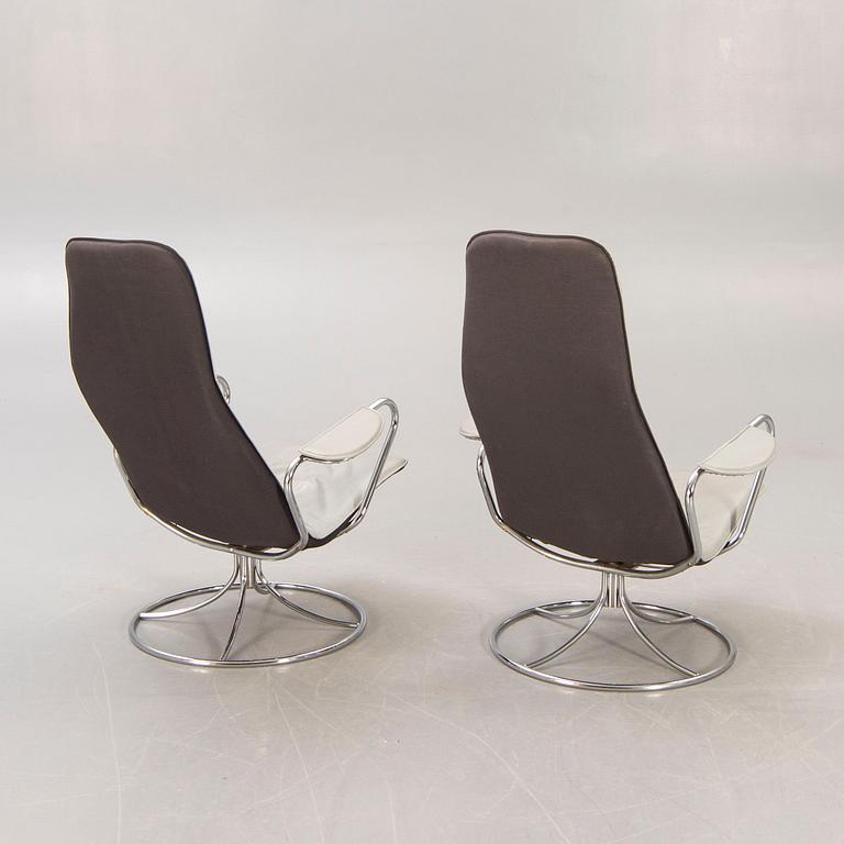 A pair of Tord Björklund Exen leather and chrome swivel chairs for IKEA 1988.