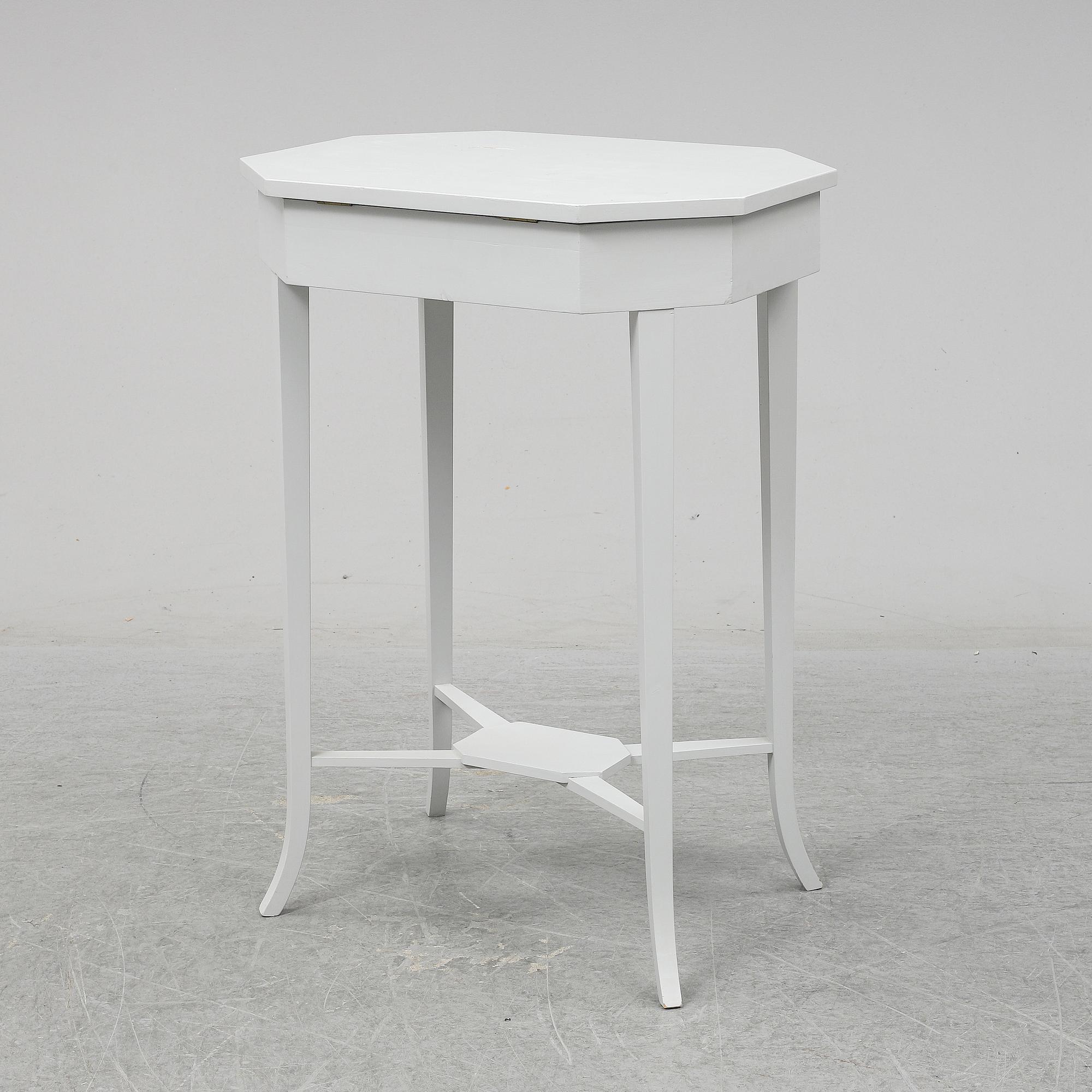 A ladys working table 20 th century.