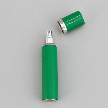 Hermès, refillable perfume bottle in leather.