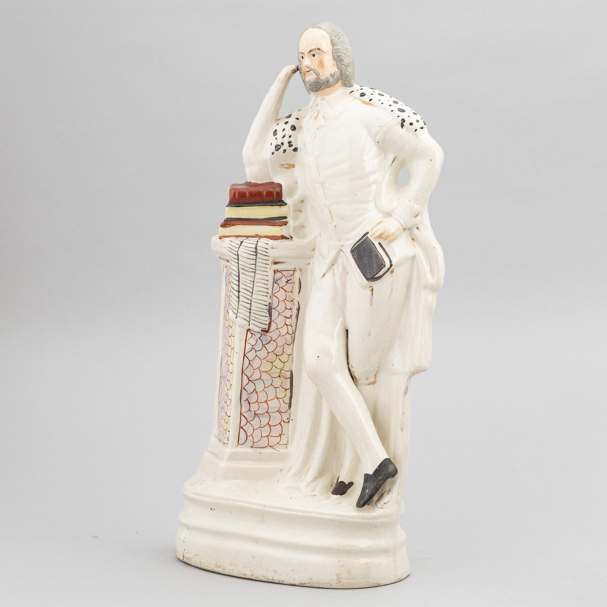 A set of eight English flintware figurines, 20th Century.