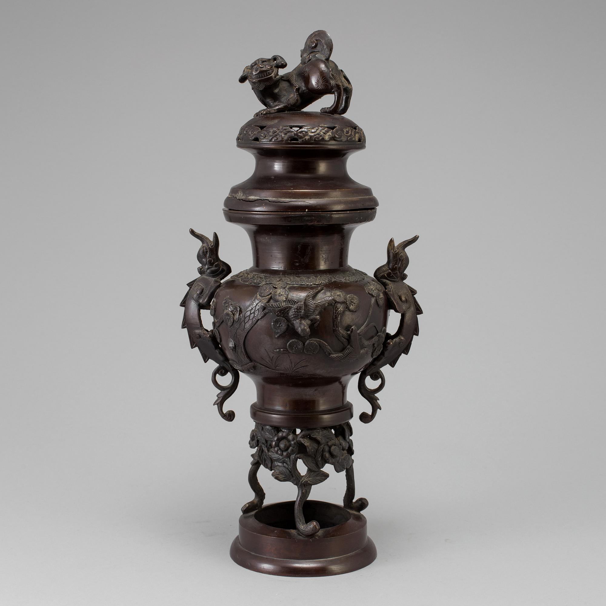A Japanese bronze vase and cover, Meiji, late 19th century.