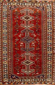 A semiantique/antique Caucasian carpet ca 210 x 130 cm.