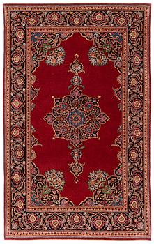 406. A semi-antique Kashan rug, ca 212 x 134 cm.