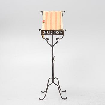 An iron book stand early 20th Century.