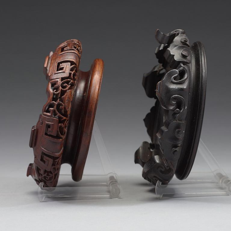 A pair of Chinese wooden stands, one presumably Zitan, Qing dynasty and early 20th Century.